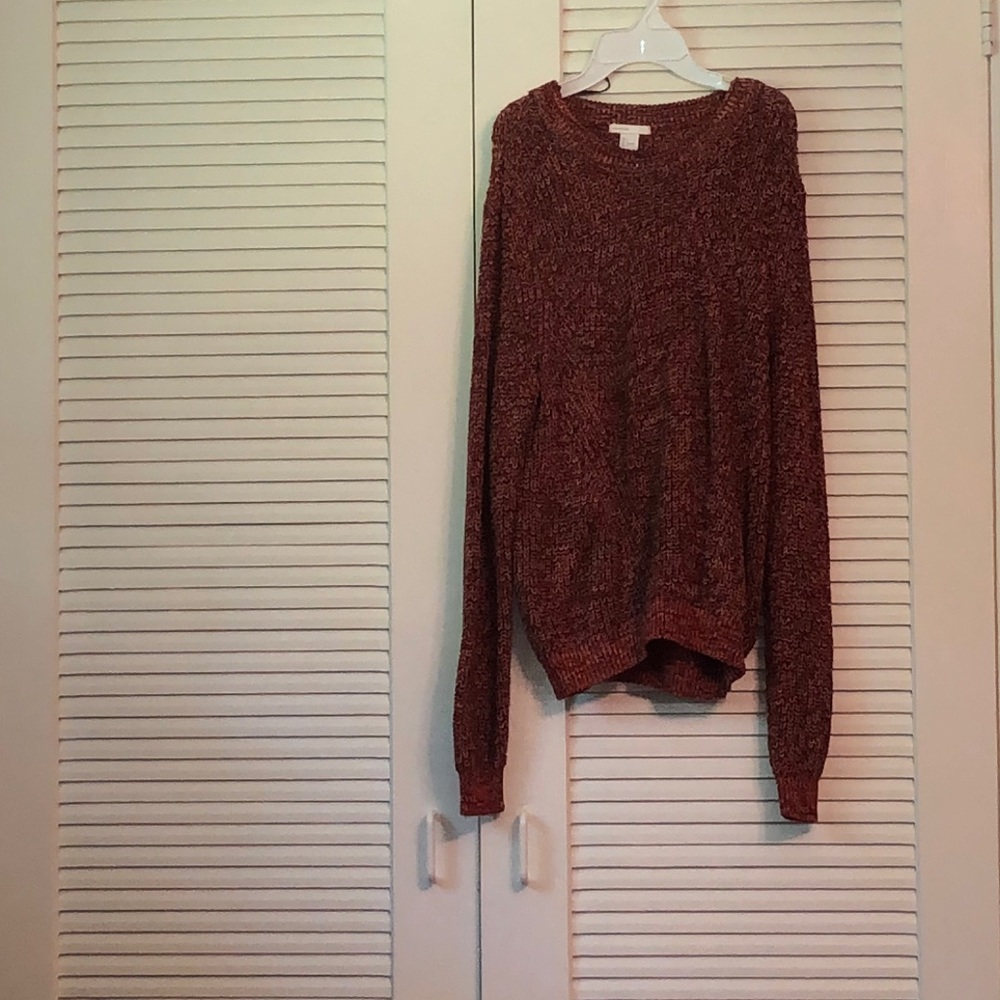 Orange and black knit long sleeve sweater